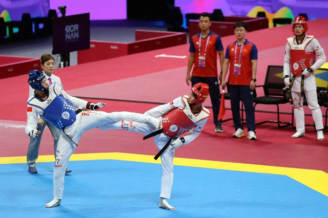 Taekwondo giành tấm HCĐ thứ 5 cho đoàn Thể thao Việt Nam tại ASIAD 19 - Ảnh 1.