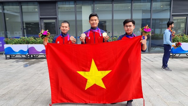 HCV Asiad 2022 đầu tiên của Việt Nam: 2 tuổi đã theo bố mẹ vào trung tâm, đánh bại nhà vô địch thế giới để lên ngôi - Ảnh 3.