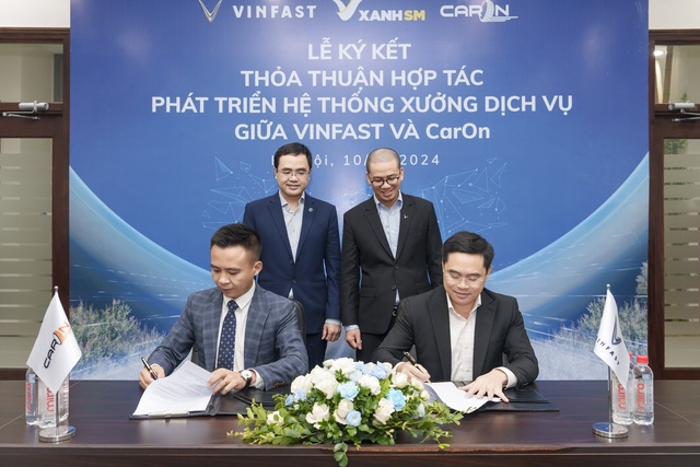 Vinfast hợp tác với CarOn mở chuỗi xưởng dịch vụ xe điện trên toàn quốc - Ảnh 2.