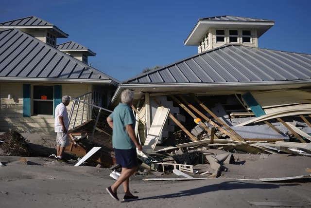 Người dân Florida trở lại cuộc sống bình thường sau bão - Ảnh 2.