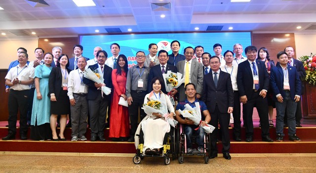 Ông Huỳnh Vĩnh Ái tái đắc cử Chủ tịch Ủy ban Paralympic Việt Nam - Ảnh 1.