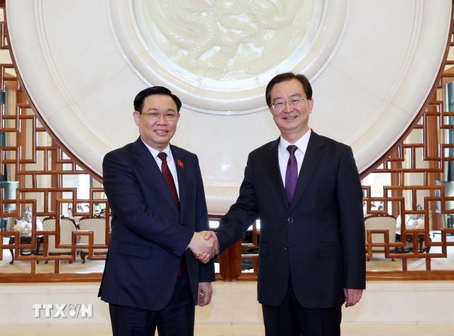 Chuỗi hoạt động ngày 11/4 của Chủ tịch Quốc hội Vương Đình Huệ tại Trung Quốc - Ảnh 3.