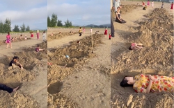 Xôn xao clip nhóm du khách đào hàng chục hố cát ở biển Cửa Lò rồi nằm để tắm