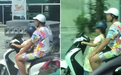 Clip: Người đàn ông ngồi sau để bé gái điều khiển xe máy chạy băng băng trên đường