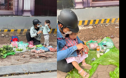 Sự thật tấm hình bố và con trai 2 tuổi bán rau ở vỉa hè Hà Nội và hành động đẹp của cô gái qua đường 