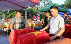 An táng 96 hài cốt liệt sĩ quân tình nguyện và chuyên gia Việt Nam hy sinh tại Lào