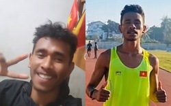 Ấn tượng hình ảnh VĐV Timor Leste để cờ Việt Nam trang trọng trong phòng, mặc áo Việt Nam tập luyện