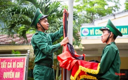 Quân và dân vùng biên giới Quảng Bình treo cờ rủ trong ngày Quốc tang Tổng Bí thư Nguyễn Phú Trọng