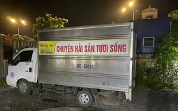 Lật tẩy &quot;bí mật&quot; bên trong thùng phi chiếc xe tải  chở hải sản tươi sống qua chốt kiểm dịch Covid-19