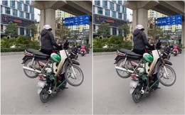 Clip: 2 xe máy &quot;làm xiếc&quot; trên đường phố Hà Nội gây chú ý